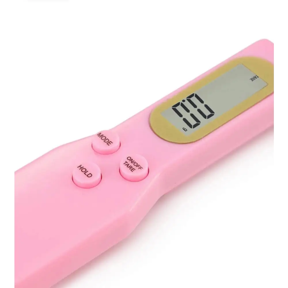 Roze digitale thermometer met scherm en knoppen.