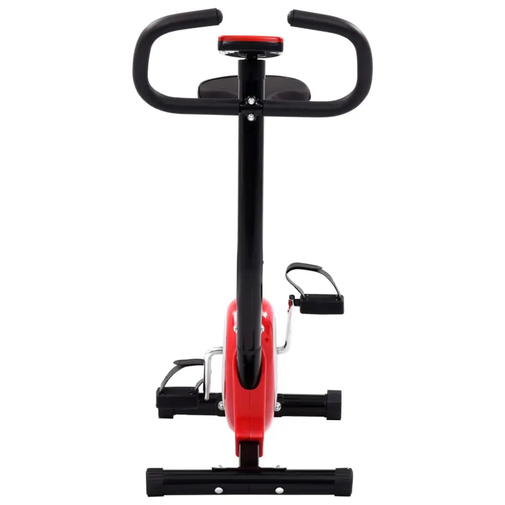 Stationaire hometrainer met zwart stuur en een rood frame.