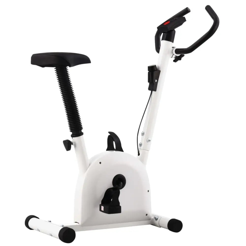 Stationaire hometrainer met een wit frame en zwarte accenten.