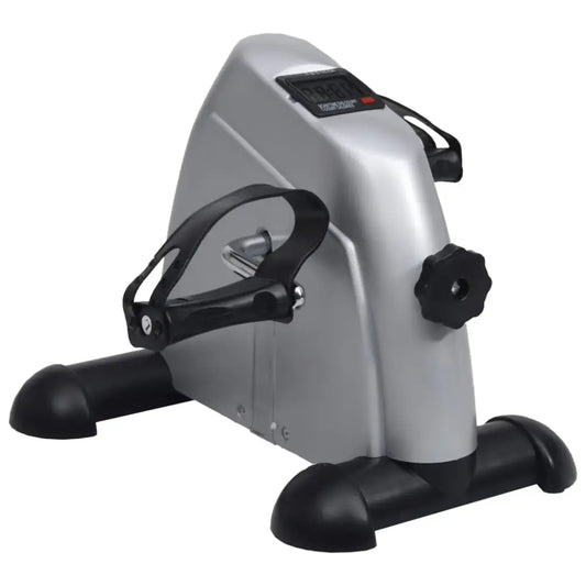 Compacte hometrainer of hometrainer voor onder het bureau met zilverkleurige en zwarte onderdelen.