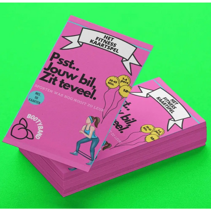 Roze boek of tijdschrift met de titel ’Psst... jouw bil zit er veel’ met een cartoonillustratie op de cover.